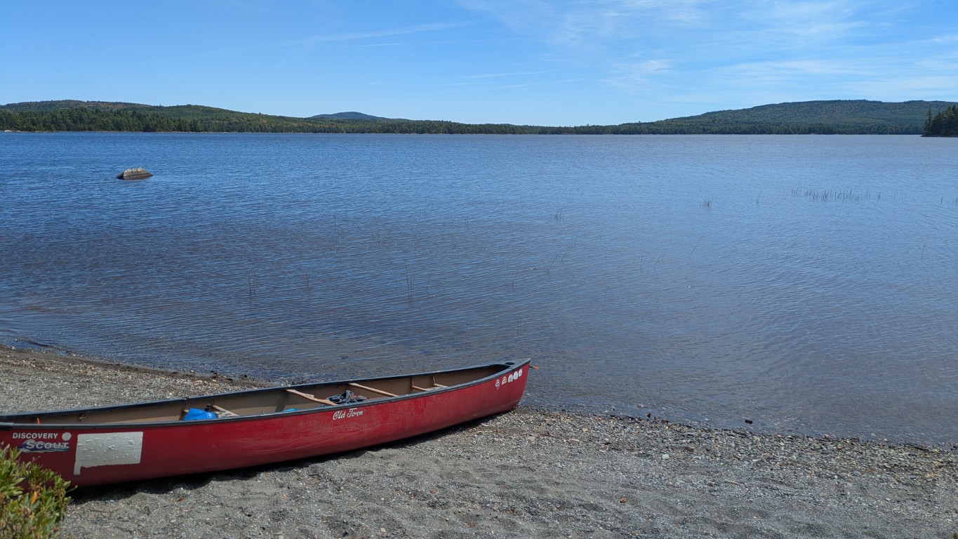 Bald Mountain Pond from the north shore - water, mountains, blue sky.